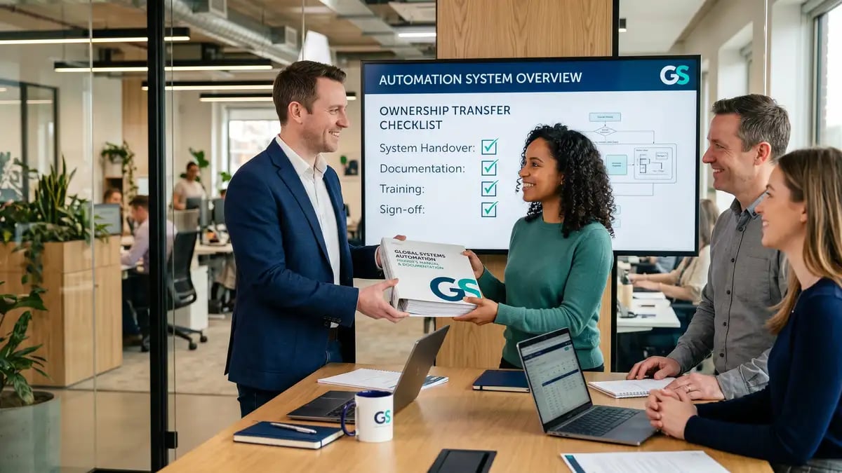 A consultant handing over a documented automation system to an internal client team with an ownership transfer checklist on screen
