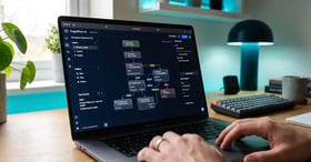 Conversational AI builder interface showing dialogue flows and intent nodes on a laptop